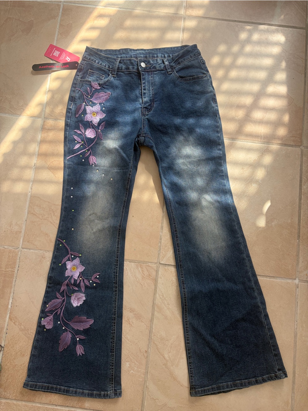 Brand new never worn ROMWE Dark Blue Straight Leg Jeans with Pink Floral